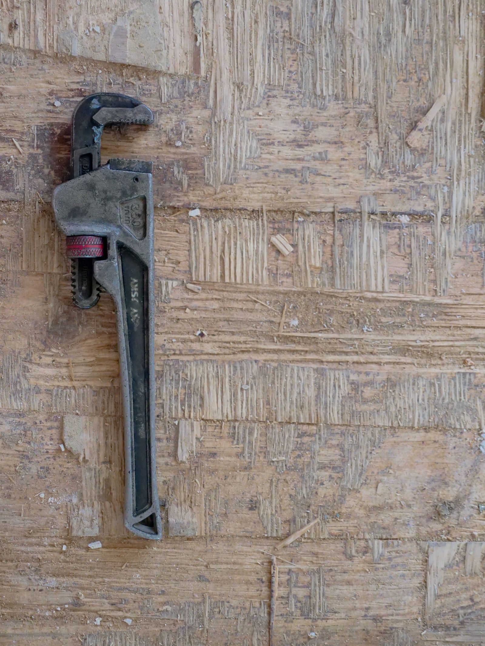 A plumber's wrench and tools — Boone Plumbing's trade, up close